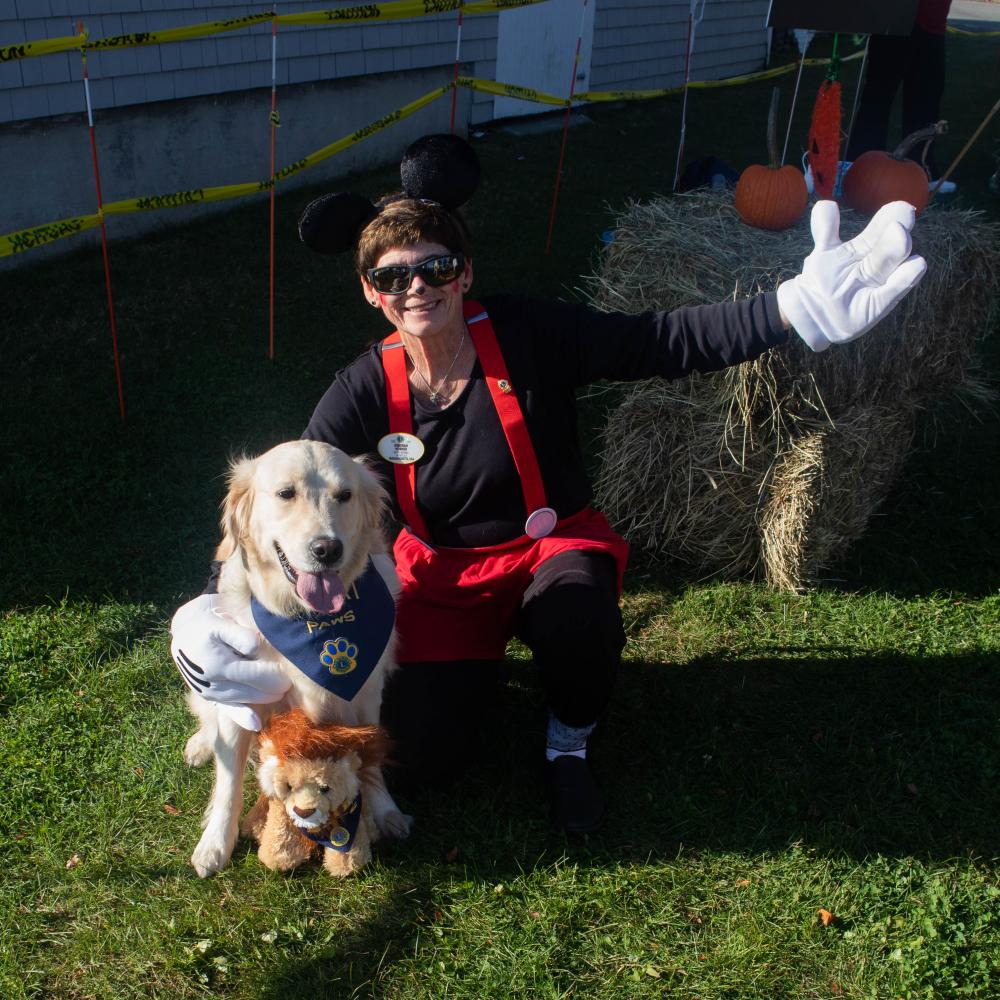Lions Club District 33-S Governor Deborah Horner with Luna at the Mattapoisett Lions Club’s Fall Free Family Fun Festival in October. Photo by Brendan Cassidy